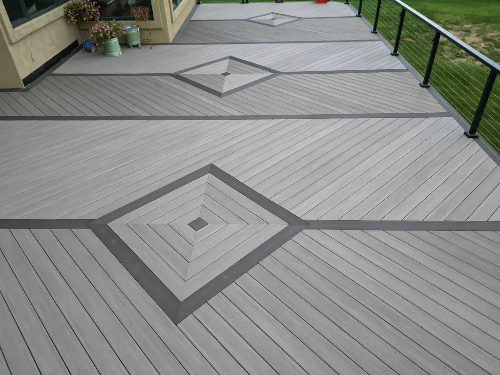 close-up-view-of-the-pvc-deck-with-cable-railing-and-potted-plants-in-twin-cities-mn